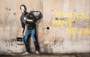 een-graffiti-tekening-van-steve-jobs-met-als-ondertitel-de_resize